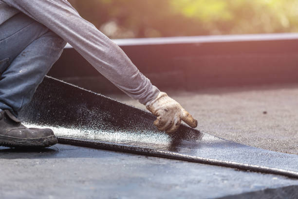 Professional Basement Waterproofing technician working in Mountain Home, AR